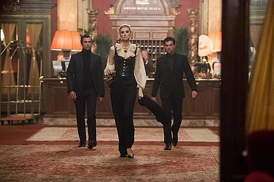 the man from uncle orange dress THE MAN FROM U.N.C.L.E. - 2015 Warner Bros film with Alicia Vikander Stock  Photo