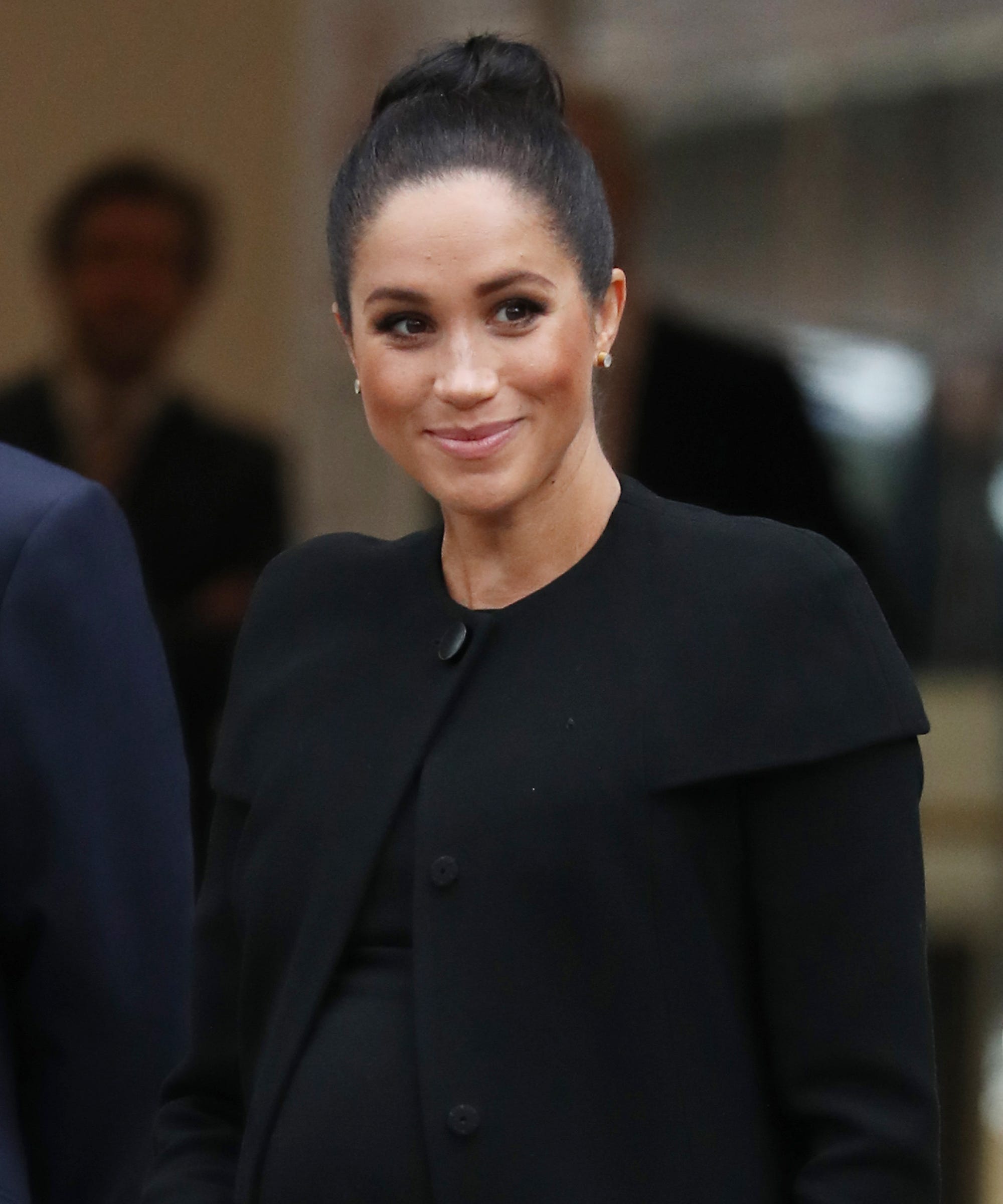 Meghan Markle Ditches Messy Hair For Chic Topknot Bun
