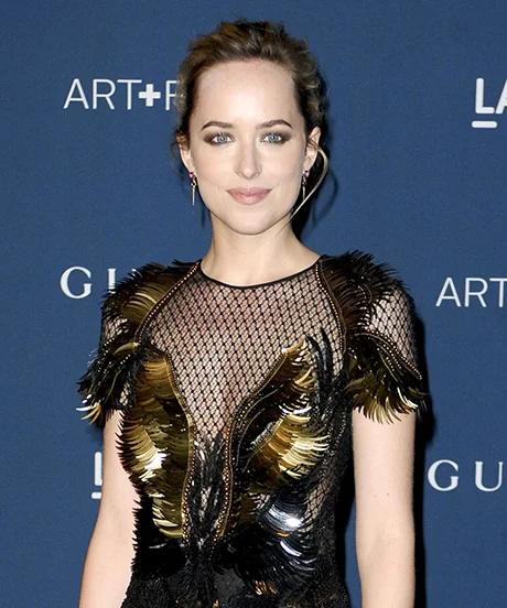 dakota johnson gold dress Dakota Johnson's Gucci Gown Proves Less Can Be More at the Oscars